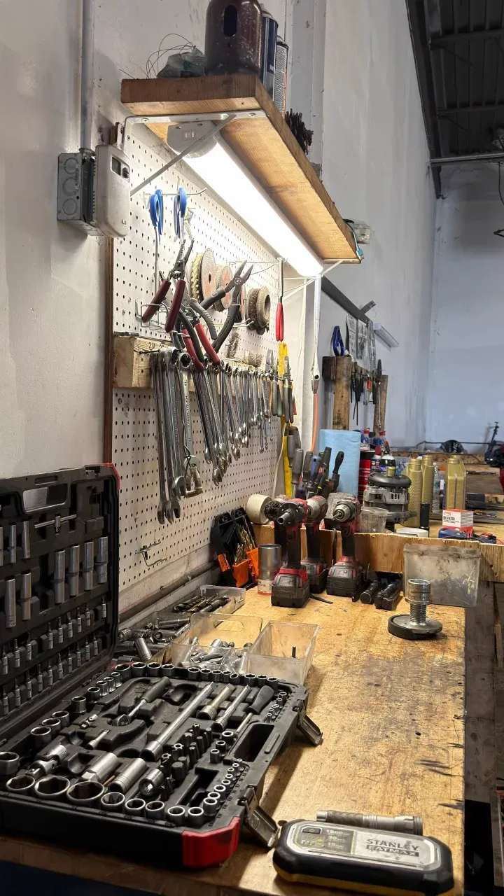 Workbench with socket sets and tools at TT Sport Garage